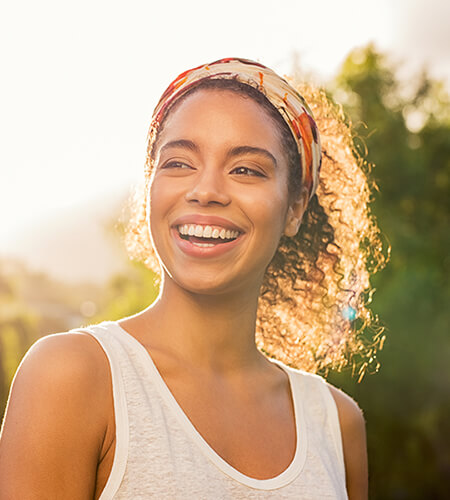 A young woman with a healthy smile