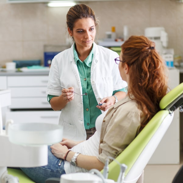 Woman in an oral cancer screening